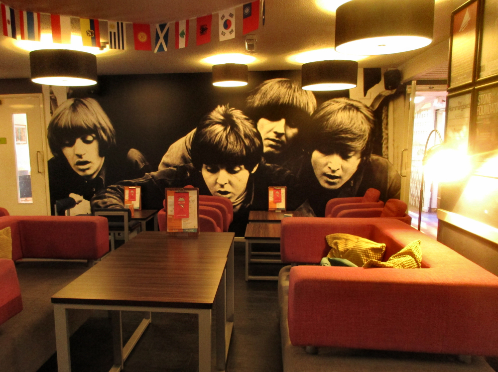 Hostel Living Room with Mural of the Beatles