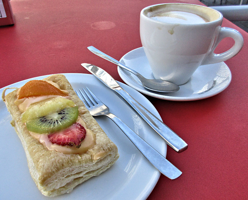 Cafe con Leche with a sweet treat in Lugo