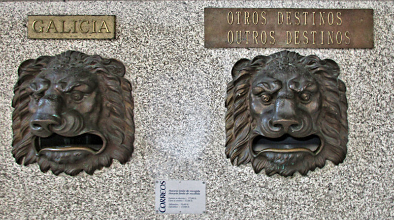 Old gorgoyle-ish lion heads on the wall of the postoffice.. You insert your mail into their mouths.