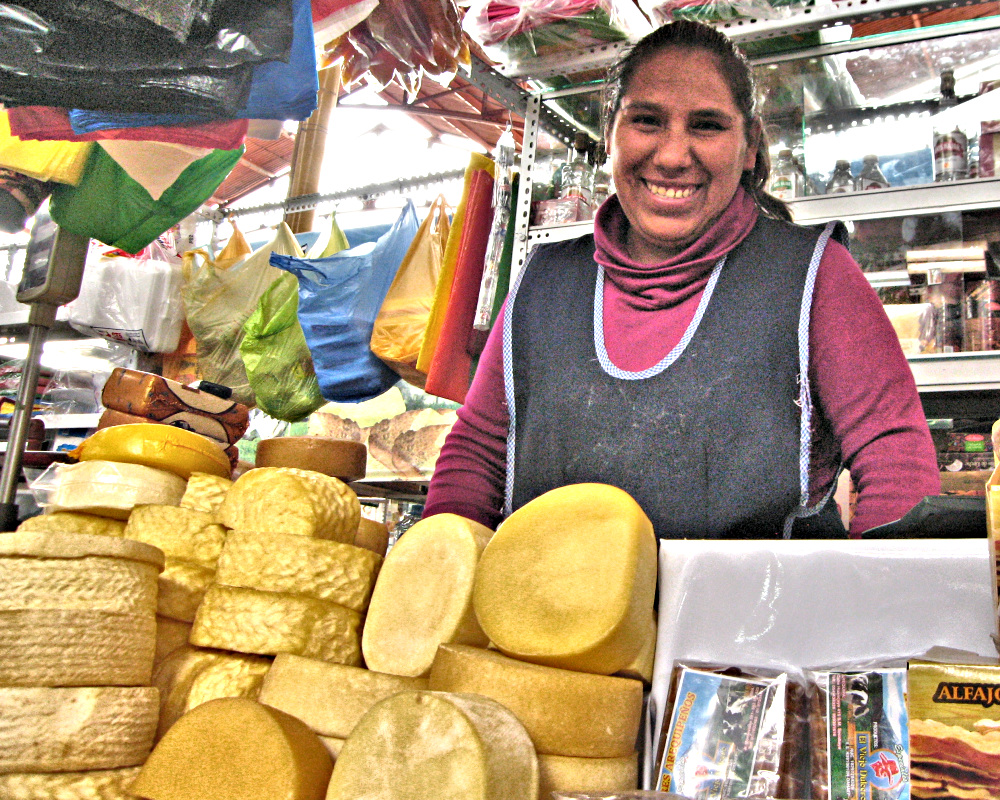 Cheese vendor in San Camillo Market in Arequipa