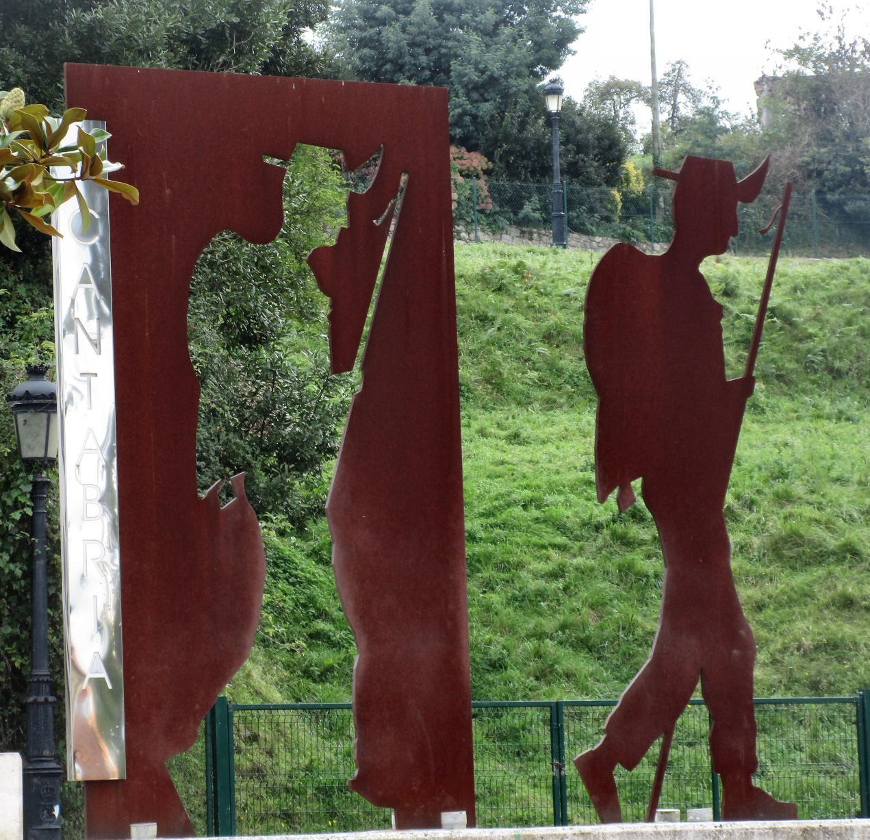 Iron sculpture of a pilgrim in the town of Cobreses, Spain