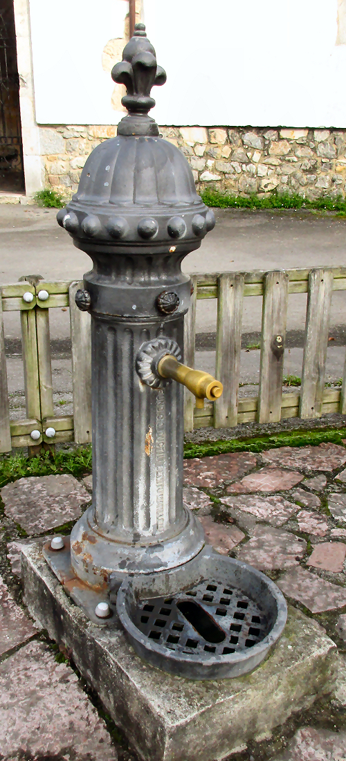 Old water fountain in Andrin, Spain