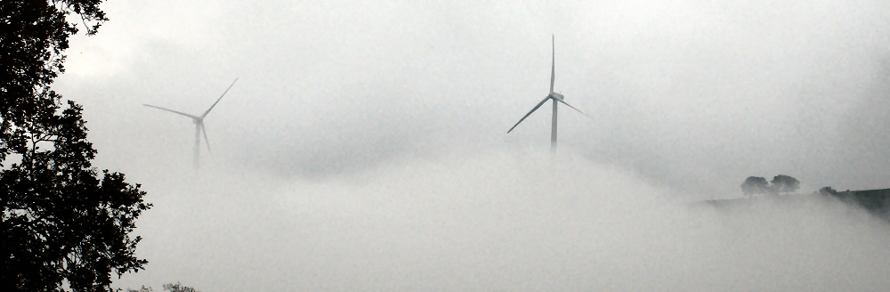 Wind turbines floating in the fog near Bodenaya