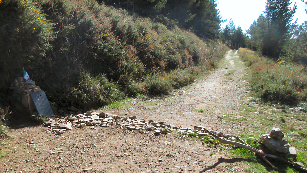 Camino trail with rocks placed on the road to mark the boundary of Asturias and Galicia