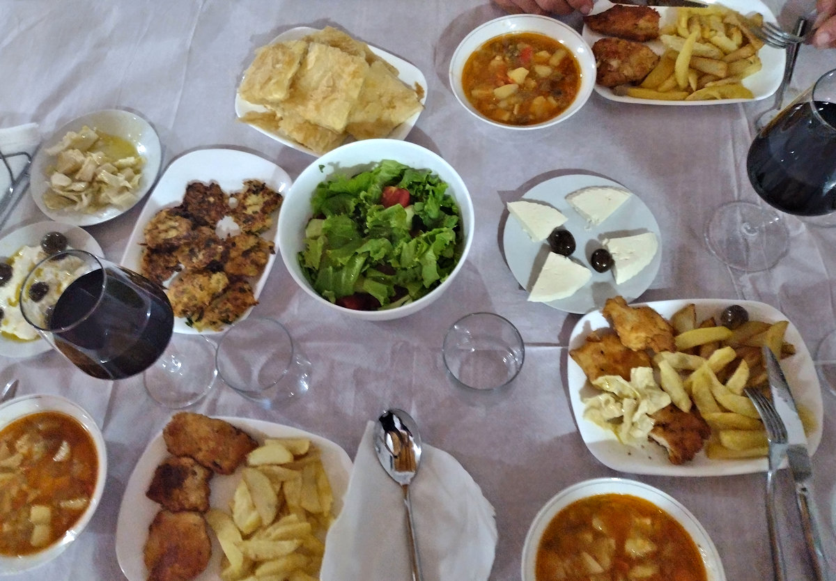 Dinner that we were served in our guesthouse. Soup, salad, chicken, cheese, various breads, wine, and more!