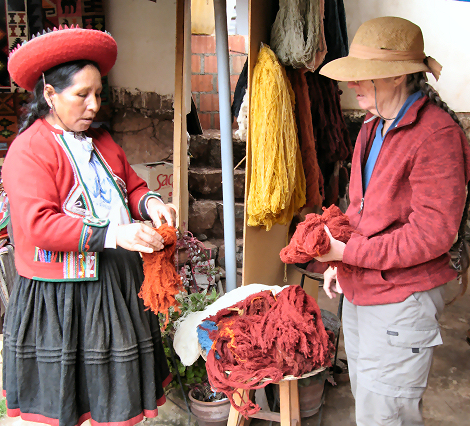Cathy and Chinchero woman talking about how the yarn is made.