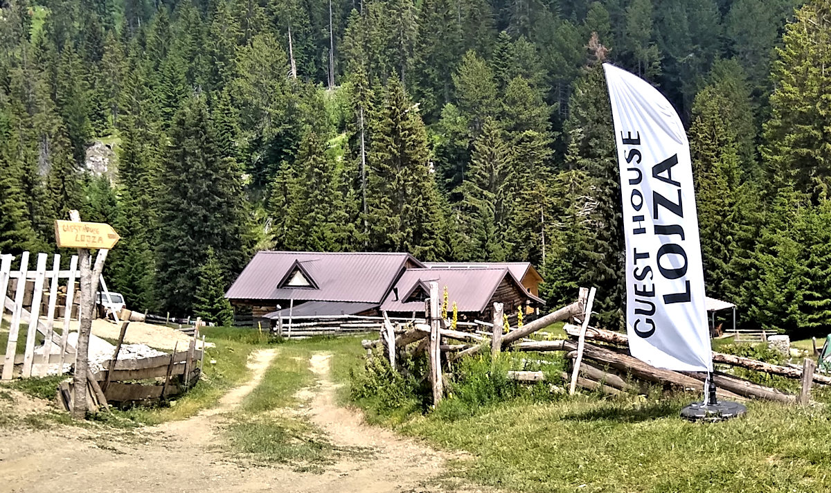 Banner in front of Guesthouse Lojza