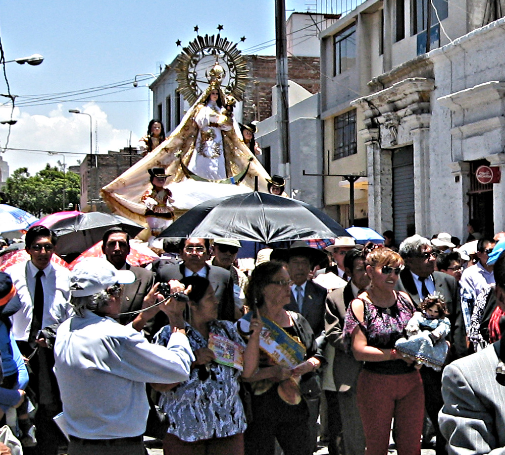 Virgin of Candelaria being carried in parade.