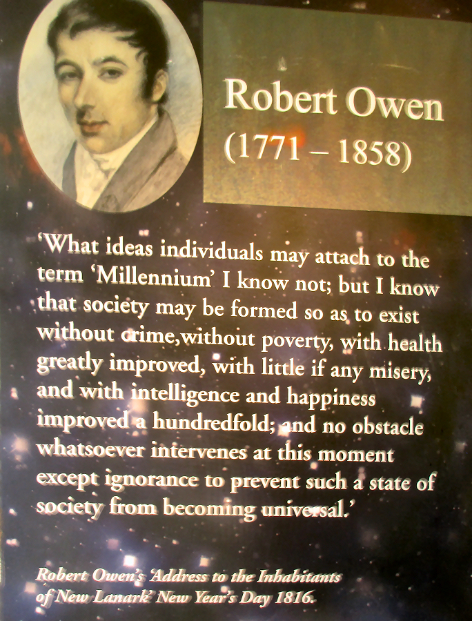 Exhibit sign with a quote by Robert Owen.