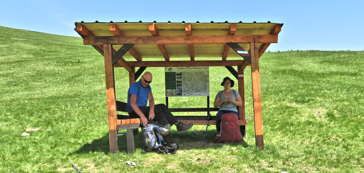 Covered rest stop with an informational sign