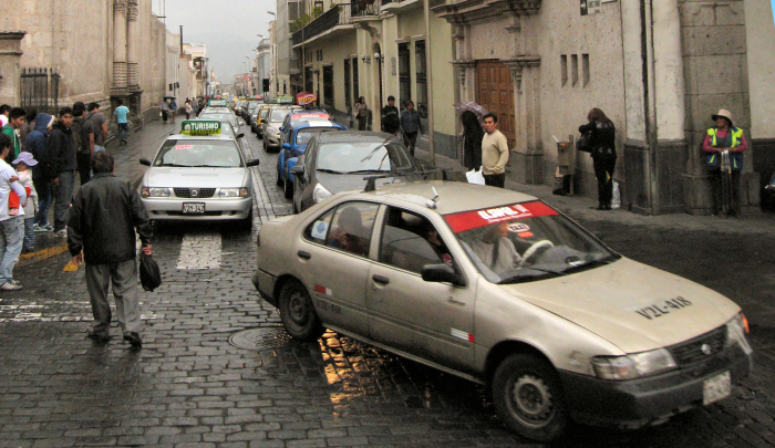 A street crowded with Taxis