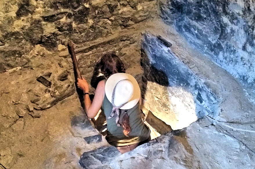 Cathy Climbing up a rickety ladder inside one of the Svaneti Towers