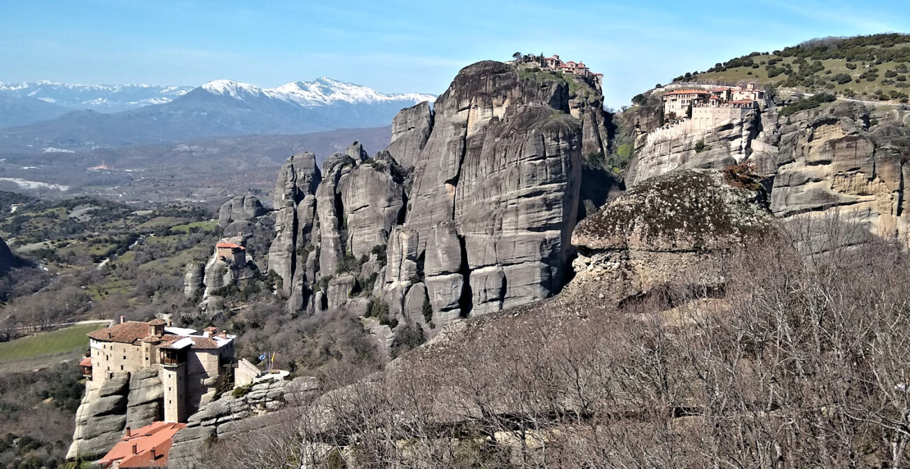 Monastery of the Great Meteora shown at the top of a cliff